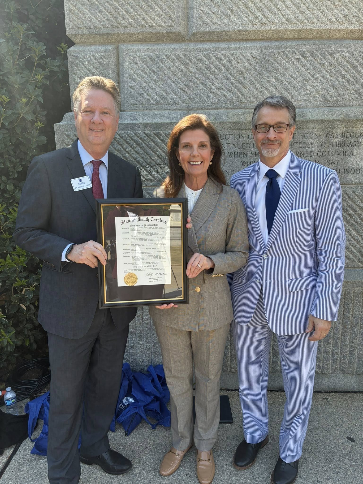 Group photo of Lt. Gov. Evette holding the proclamation with the CHE and SCICU presidents.